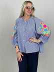 Bluse mit Stickerei und Streifen in Blau
