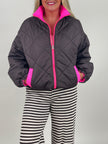 Steppjacke mit pinken Kontrastdetails