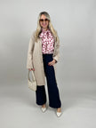 Bluse mit Punkten in Hellrosa/Rot