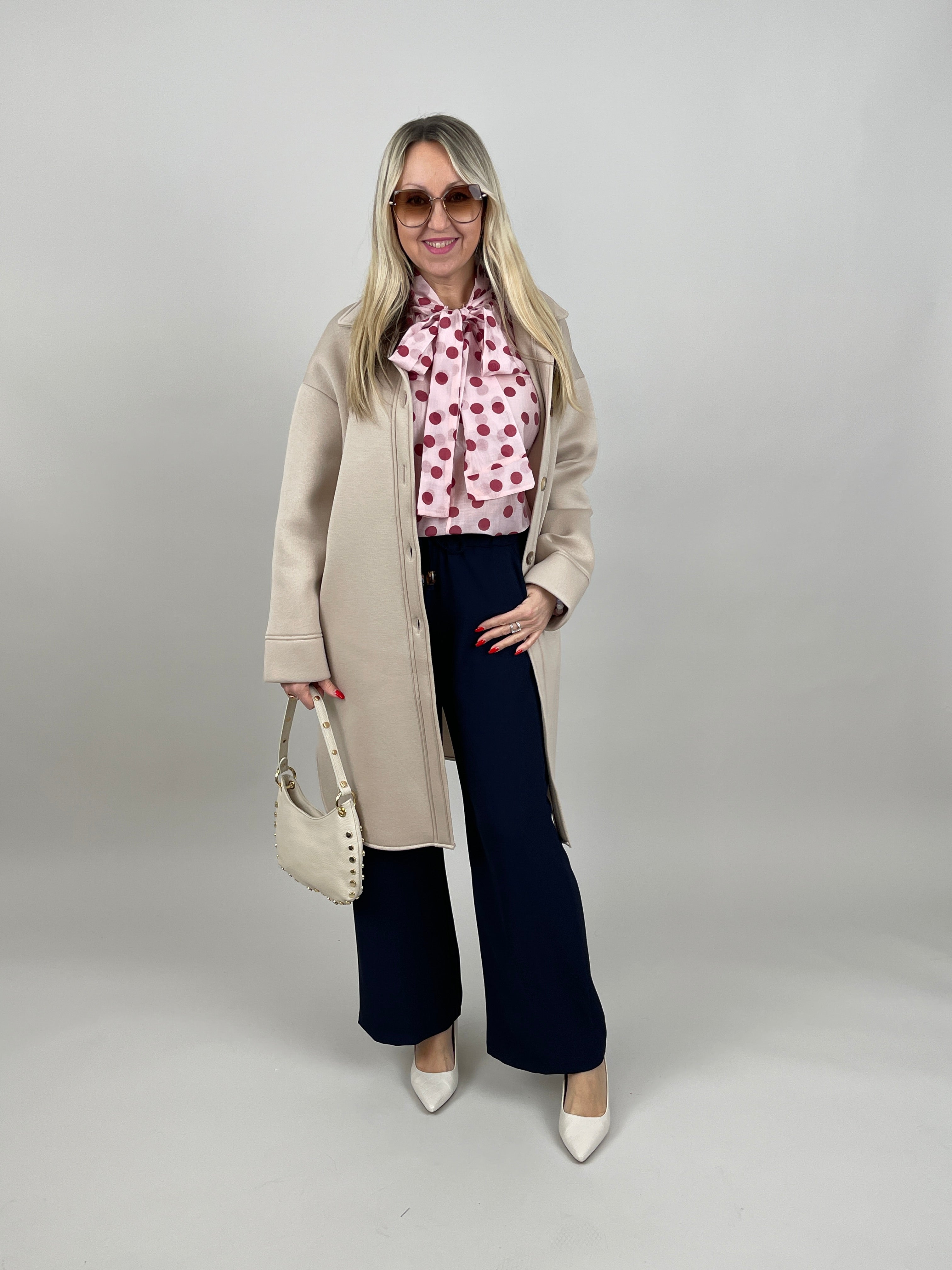 Bluse mit Punkten in Hellrosa/Rot