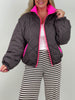 Steppjacke mit pinken Kontrastdetails