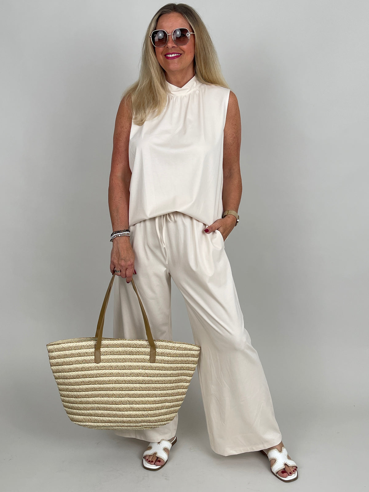Top Butterstoff mit Schleife in Creme