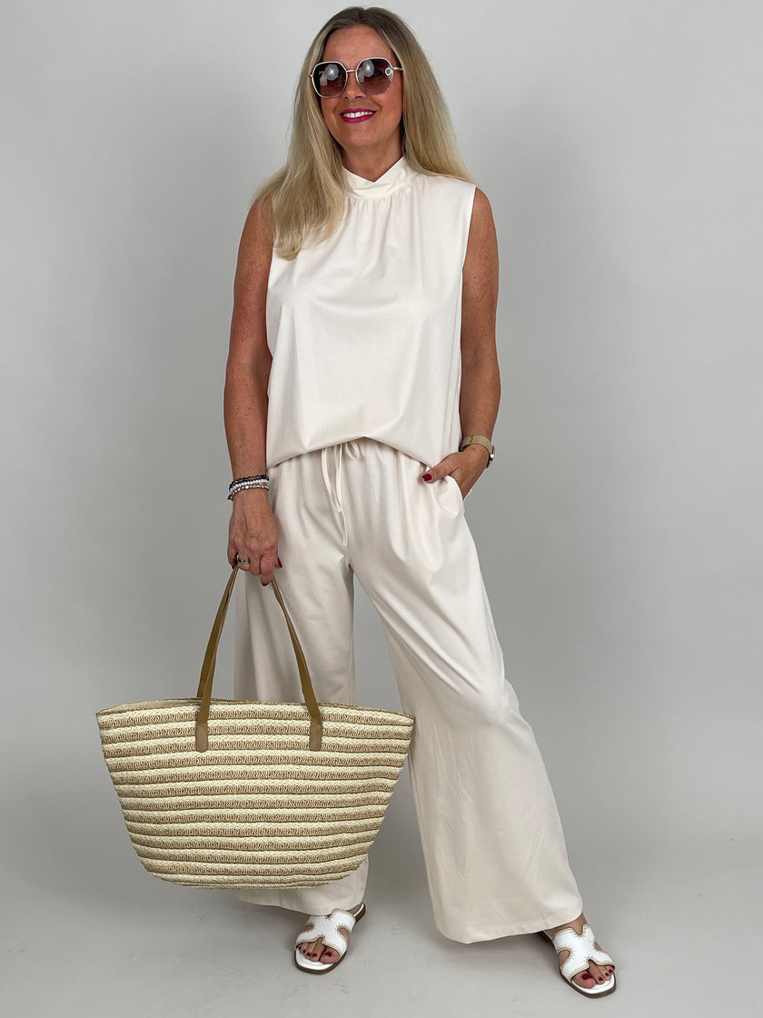 Top Butterstoff mit Schleife in Creme