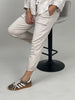 Jogpants mit Nieten-Details in Beige