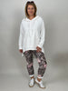 Velours-Hose mit Blumenprint in Braun/Beige