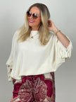 Strickpullover mit ausgefallenem Ärmel in Creme