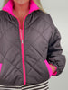 Steppjacke mit pinken Kontrastdetails