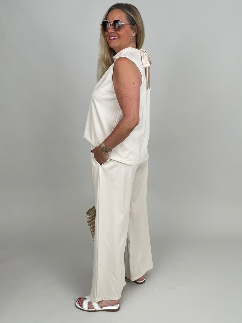 Top Butterstoff mit Schleife in Creme