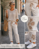 Hose mit Häkelblüten in Beige