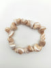Armband mit Steinen von MOSHI in Beige Artikel 5728