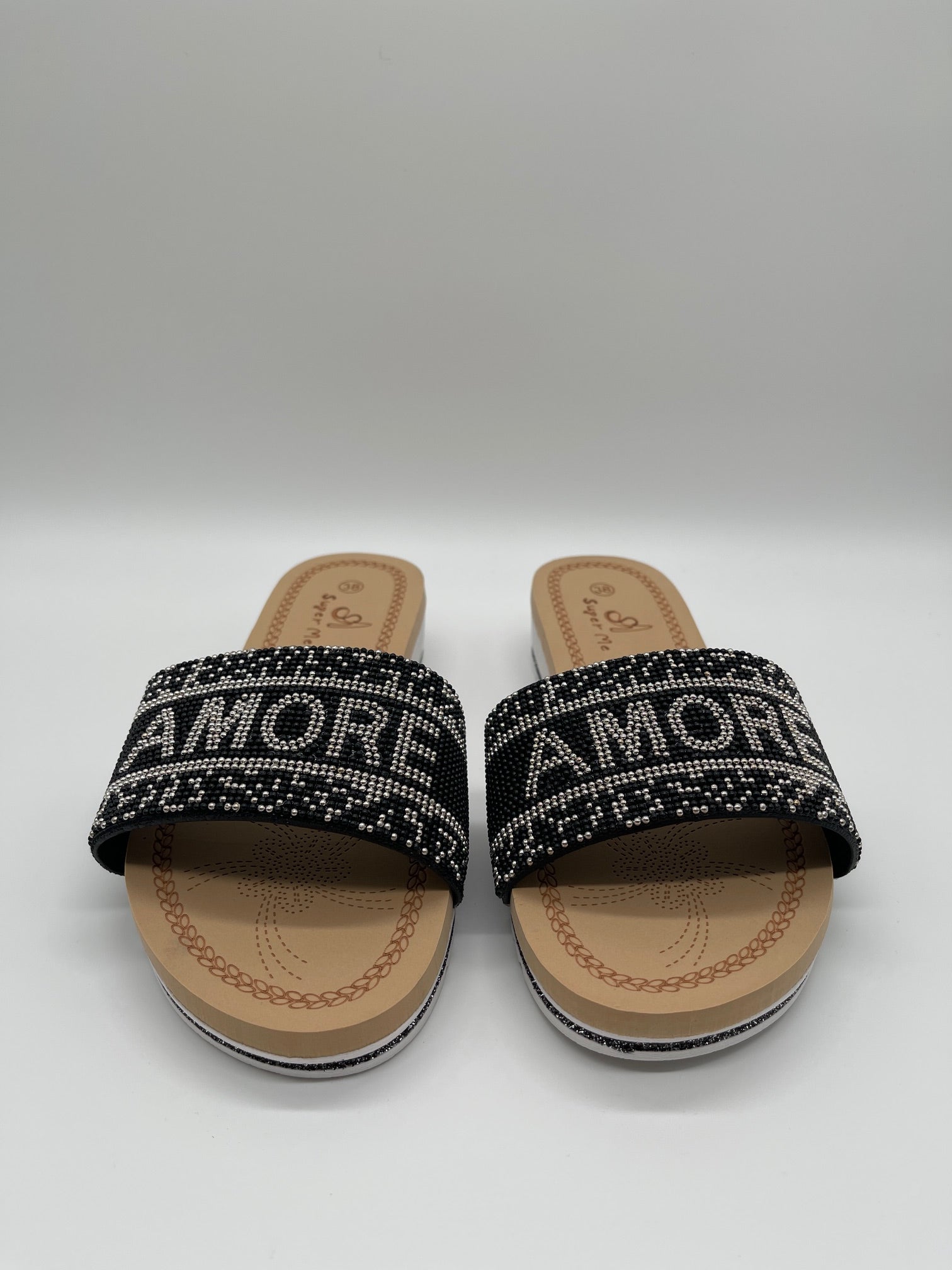 Pantolette mit Schrift in Schwarz