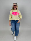 Sweatshirt mit Schriftzug in Gelb/Neonpink Artikel 6860
