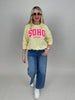 Sweatshirt mit Schriftzug in Gelb/Neonpink