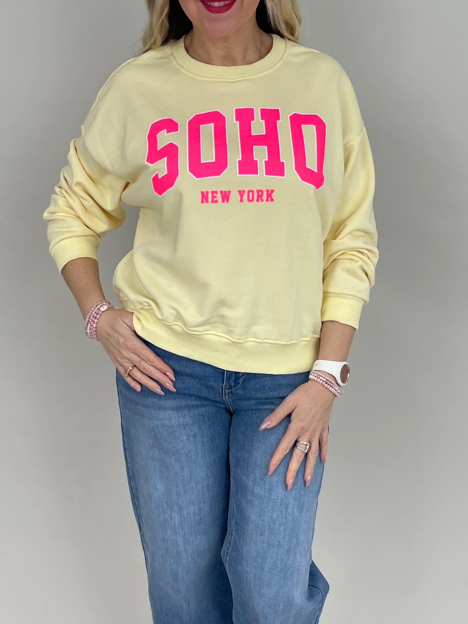 Sweatshirt mit Schriftzug in Gelb/Neonpink Artikel 6860