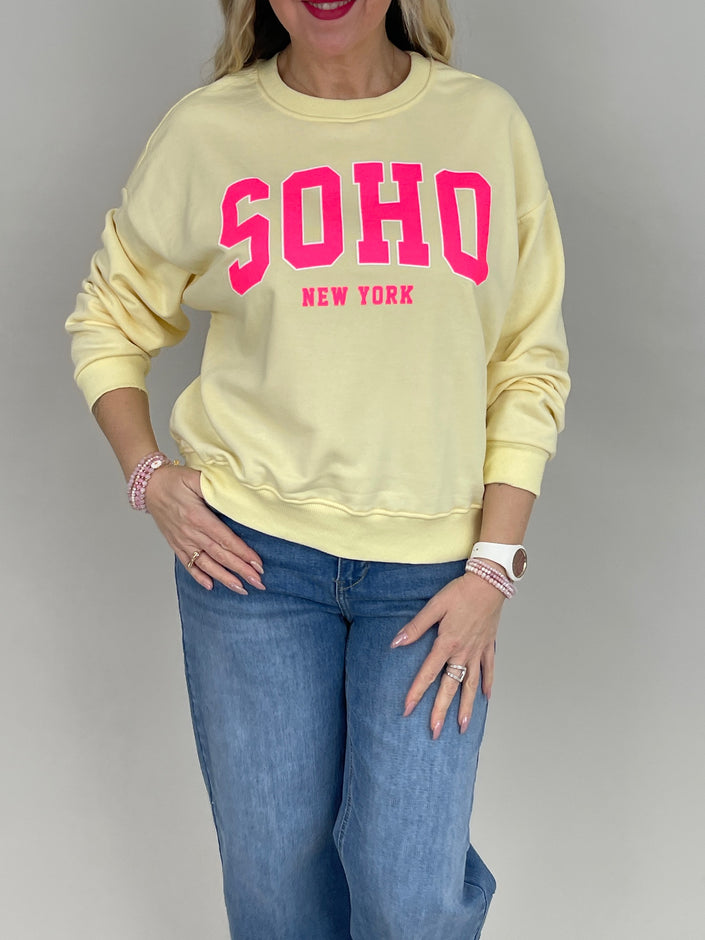 Sweatshirt mit Schriftzug in Gelb/Neonpink