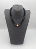Kette Schwarz mit goldenen Details