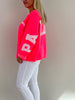 Sweatshirt mit Schriftzug im Rücken in Neonpink Artikel 6320