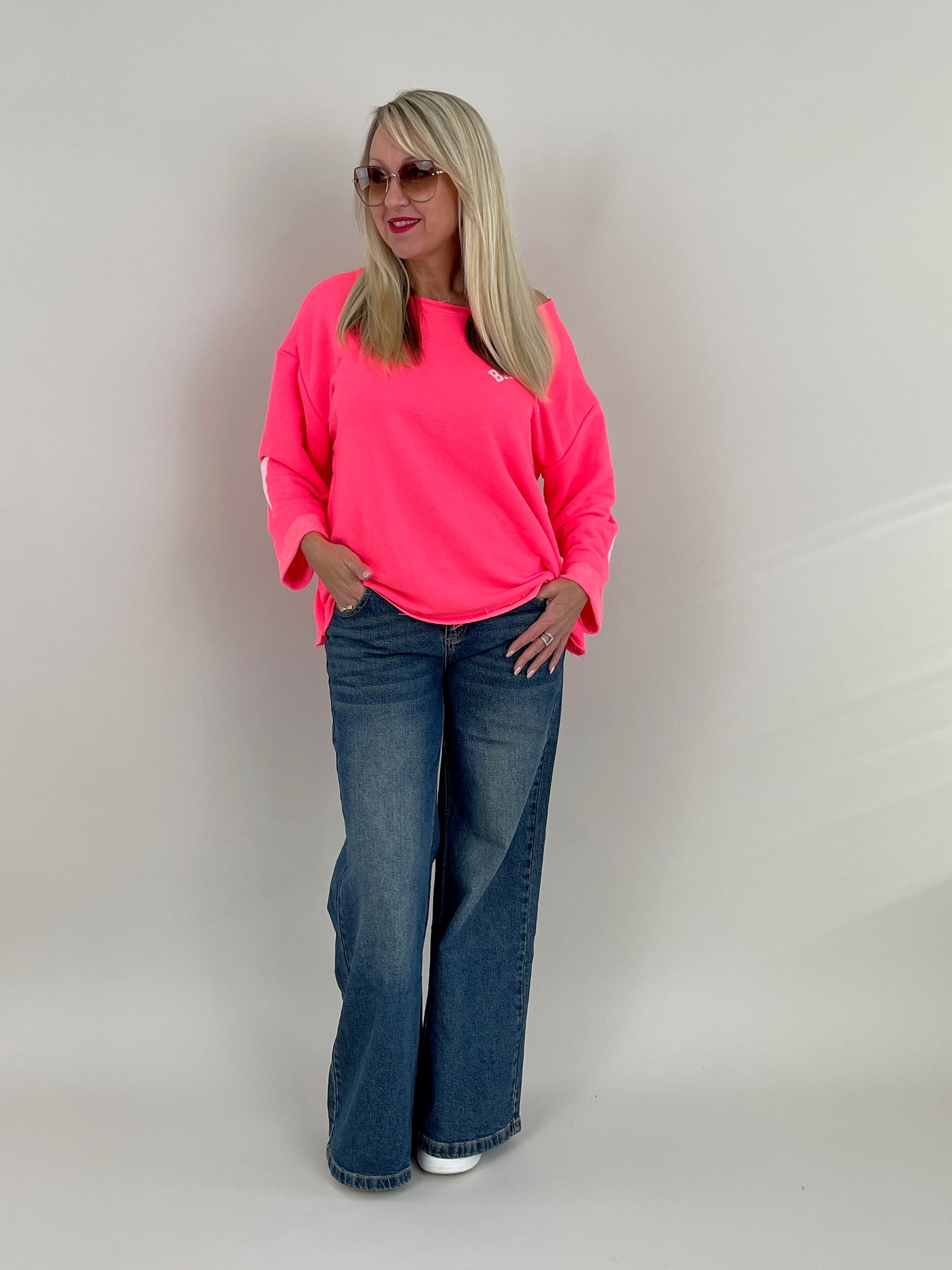 Sweatshirt mit Schriftzug im Rücken in Neonpink Artikel 6320