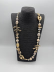 Kette mit Details in Beige