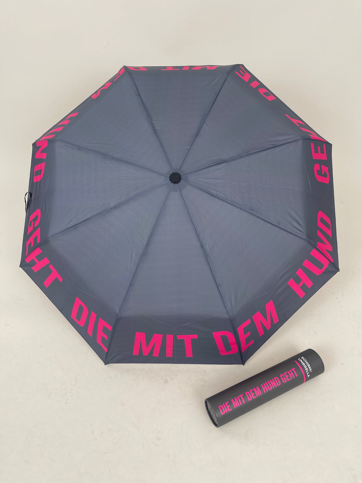 Regenschirm Die mit dem Hund geht