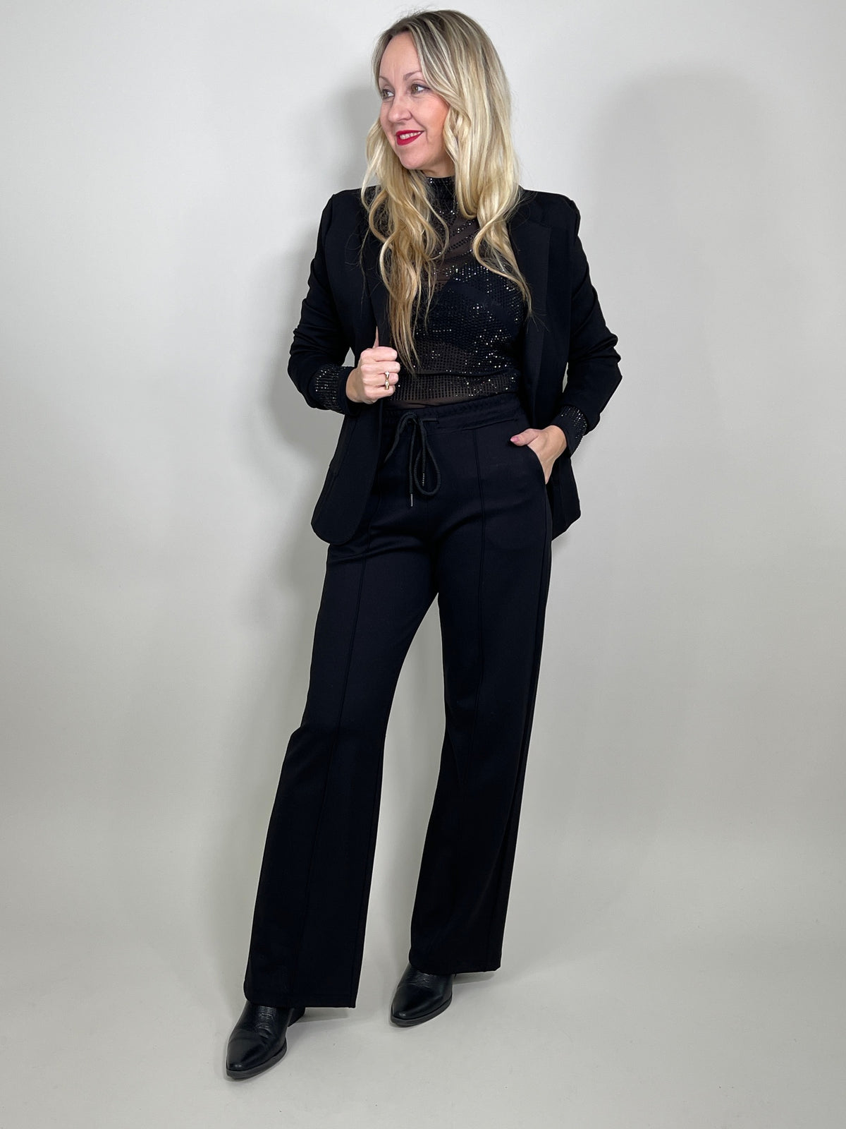 Body aus Mesh mit schwarzen Glitzersteinchen