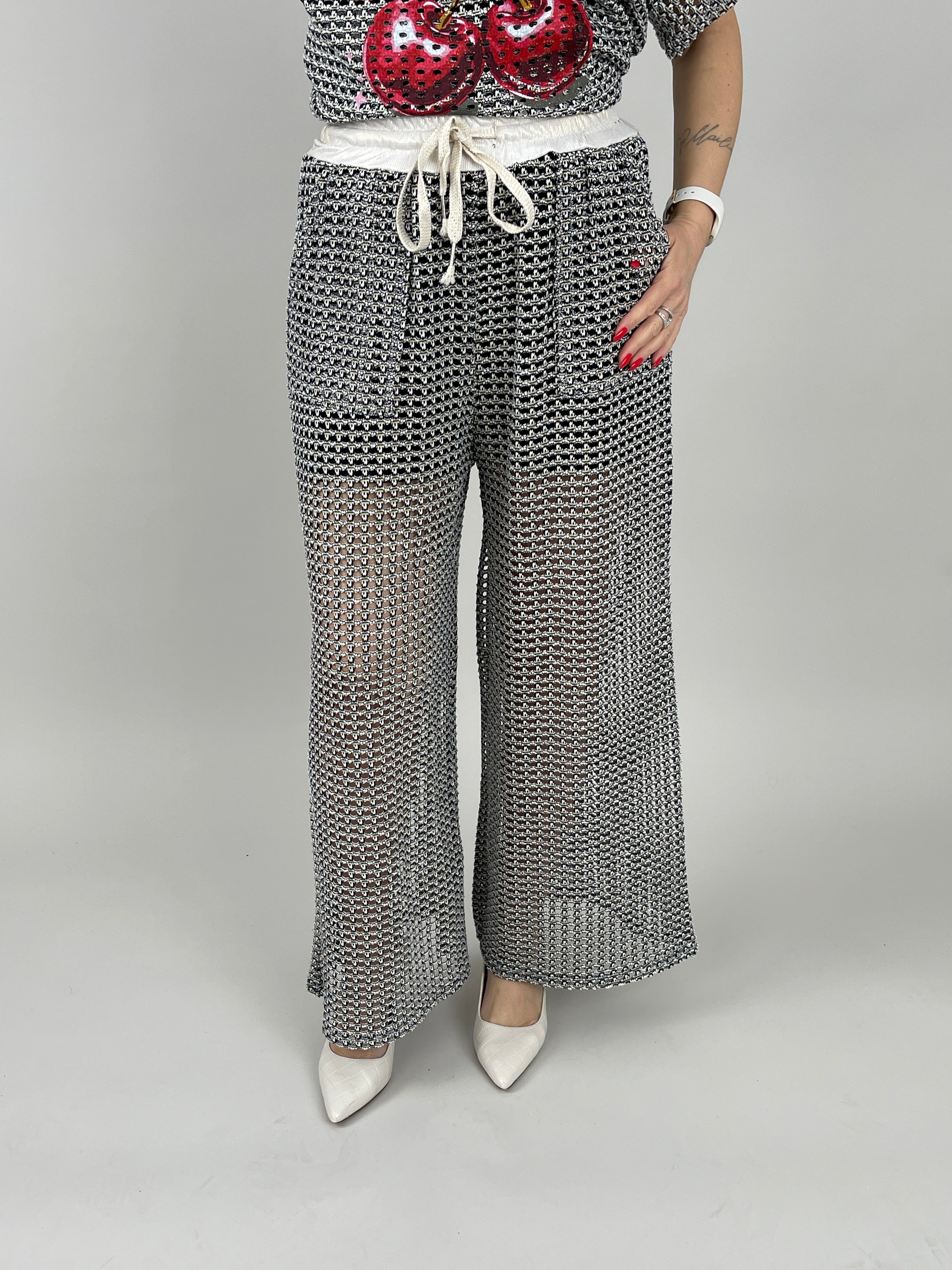 Transparente Hose in Beige/Schwarz